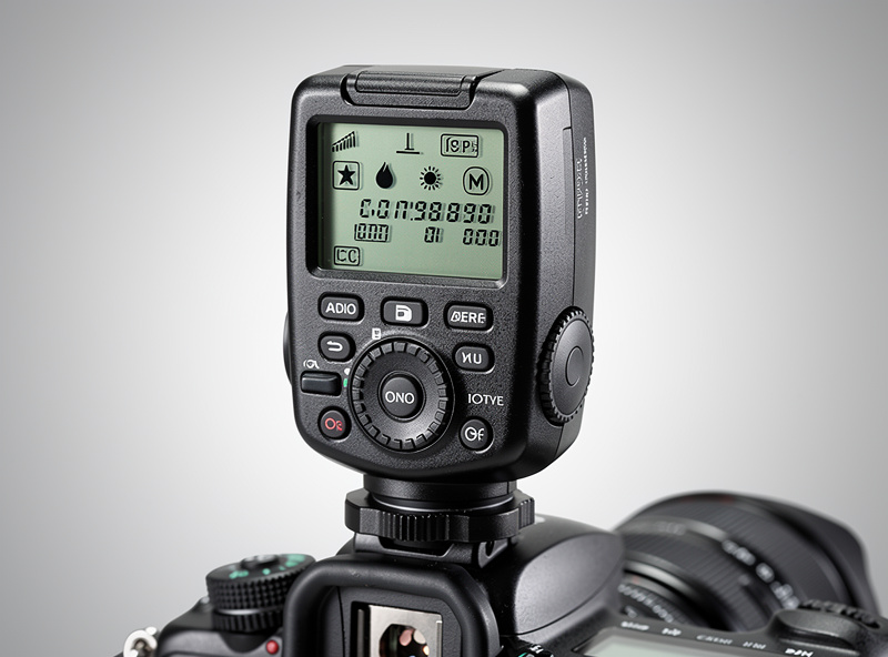 Three off-camera flash starter kits laid out showing budget, mid-range, and pro options