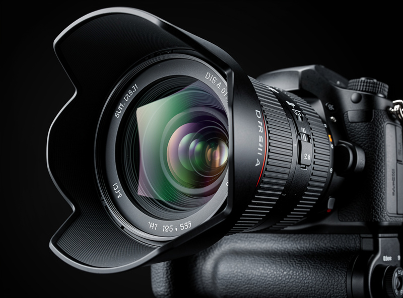 Fast wide-angle lens at f/2.8 mounted on DSLR for astrophotography