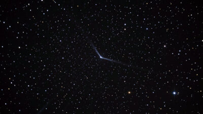 Corner stars showing comet-shaped coma distortion in an astrophotography lens test