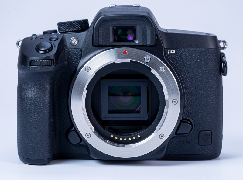 Close-up of a mirrorless camera body with the lens removed showing the floating in-body stabilization sensor unit